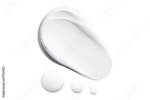 Ointments and drops of a beautiful white cream on an empty background. isolated