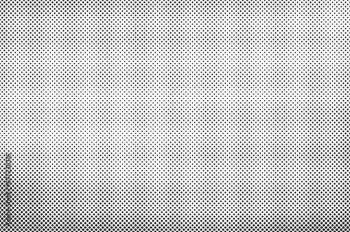 Halftone effect vector background. Dotted seamless pattern. Fading background. Simple small geometric pattern. Repeat faded texture. Repeated abstract fades dot pattern.