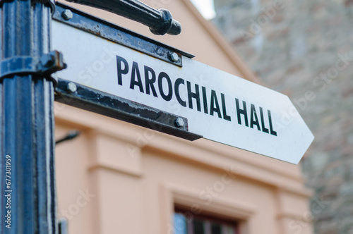 Street sign pointing to the Parochial Hall