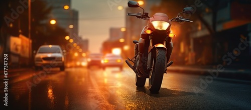 Cars and motorcycles on dimly lit road at night Copy space image Place for adding text or design