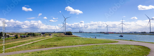 Panorama of the harbor of Rotterdam with wind turbines 