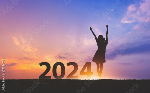 New year 2024 traveler woman with sunset sky background travel concept