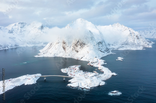 Aerial view on the Lofoten Islands, Norway. Landscape in winter time during day time. View from drone. Aerial landscape. Mountains and water. Norge image