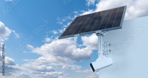 Autonomous surveillance camera with solar panel on a background of blue sky. Perimeter security