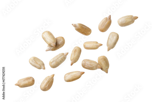 Sunflower seed kernels fly on a white background. Isolated