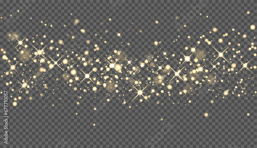 Christmas background made of glitter dust. Glowing gold sparkles. The glitter of golden dust in the rays of light. Abstract festive background