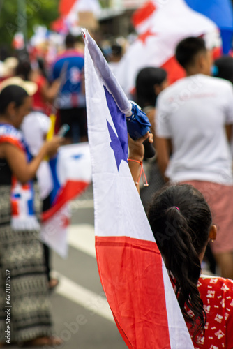 young girl with the panama flag