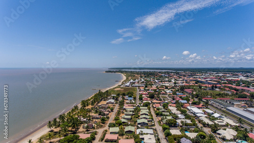 Sandy beaches line Kourou's bustling streets.