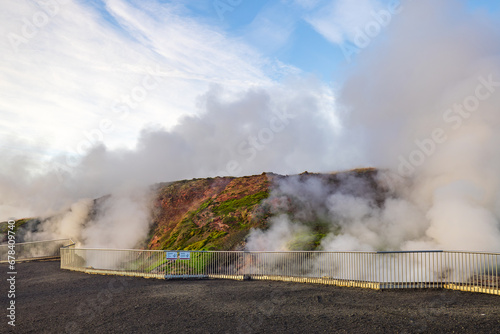 geothermal steam rises from the earth at Deildartunguhver, Iceland
