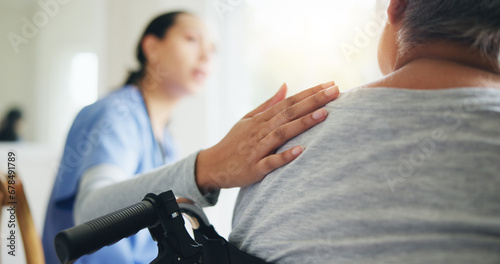 Woman, hand and nurse with patient in wheelchair for elderly care, support or trust at old age home. Closeup of medical doctor or caregiver listening to person with a disability for health advice