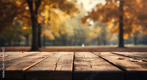 Golden Autumn Morning Light Bathing a Wooden Table with Scattered Fall Leaves
