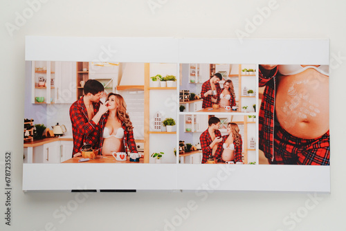 The pages of a photo book with color photos of a pregnant blonde and a man. 