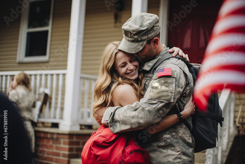 Soldier returning home after military mission of war. Emotional family reunion, girlfriend hugging American soldier young man boyfriend