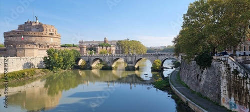 Panoramic shot of the St. Angelo Bridge going over the Tiber river in Rome, Italy