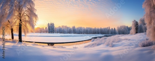 panoramic view of a snow-covered golf course at sunrise, with frosty trees and a peaceful, undisturbed landscape