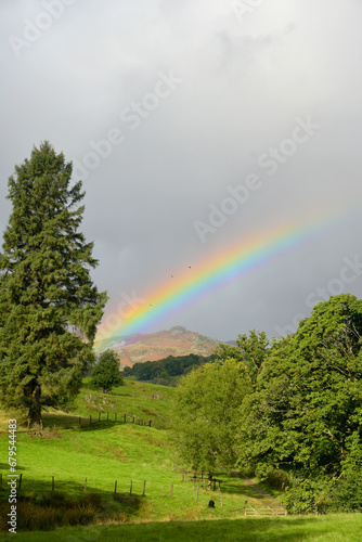 A rainbow shining above the valley of Little Langdale, near Skelwith Bridge in the Lake District