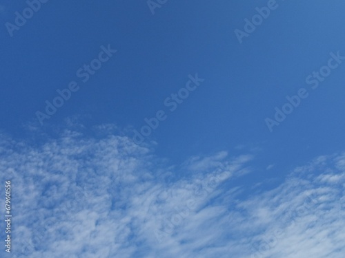 Full frame of pretty blue sky with unusual scudding cloud formation