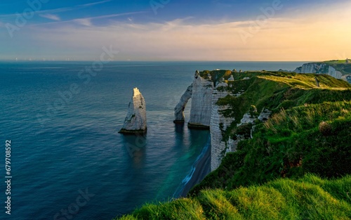 white chalk cliffs and arch in the sunrise 
