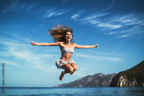 Joyful Leap: Young Woman Enjoying Vacation by Water
