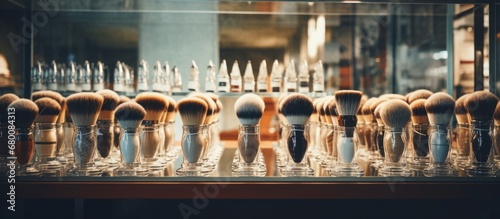 Male grooming accessories displayed in a beauty salon window rows of brushes razors and grooming tools Copy space image Place for adding text or design
