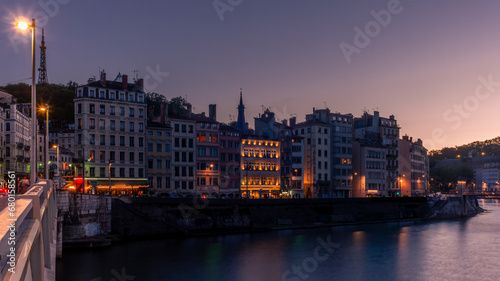 Old Lyon reflecting on the Saone river at night
