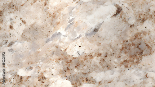 Seamless beige granite texture with quartz and feldspar spots