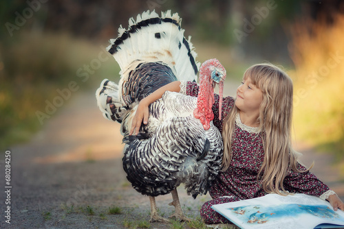 Girl with long hair on dress with turkey bird on countryside at sunset
