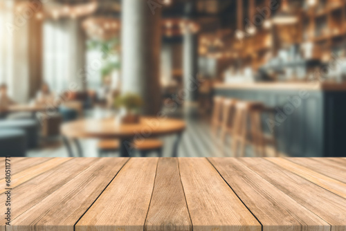 Empty wooden table space platform and blurred restaurant or coffee shop background for product display montage