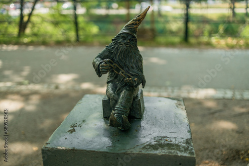 Small dwarf statue on the market square in Wroclaw. High quality photo