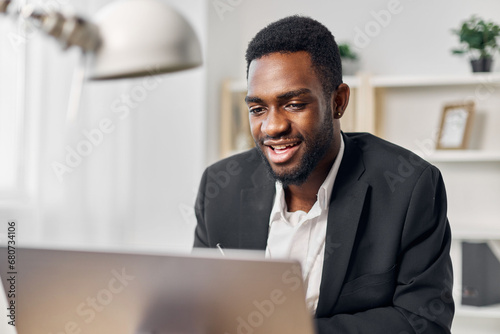 student man office job online education freelancer computer using african american laptop