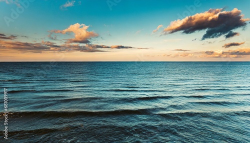 view of vast ocean horizon and sky at dusk