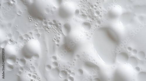 Foam bubbles. Abstract white soapy foam texture. shampoo foam with bubbles. Face cleansing mousse sample.