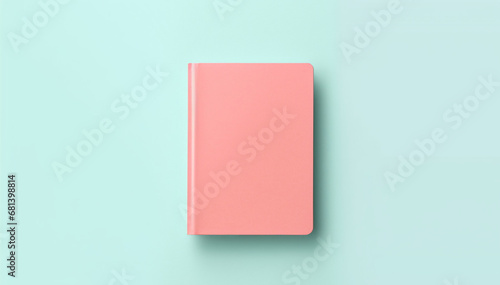Notebook mock-up isolated on blue color background. Flat-lay notepad closeup. Pink journal diary softcover. Blank template paper notebook canvas. Note-taking planner. Organizer copy space
