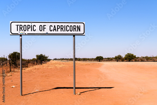 Road sign at the tropic of capricorn on the road from Windhoek to Rehoboth, Namibia.