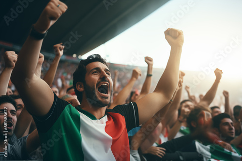 Italian fans cheering on their team from the stands