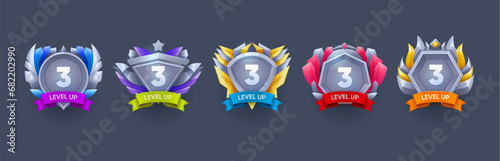 Game level up and win metal badges. Arcade level up prize, gambling app victory realistic vector sign, gaming task complete, win rank or achievements rating realistic vector badge with silver medals