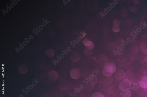 Fondo morado/violeta oscuro - fucsia con luces efecto bokeh ideal para diseño de navidad/fin de año/fiestas/celebración. Se puede usar como fondo