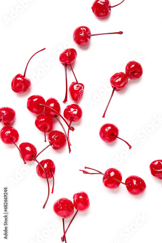 Tasty maraschino cherries on white background