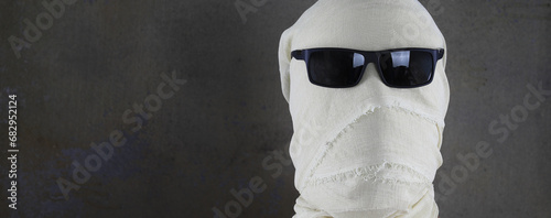 portrait of a mummy in white bandages