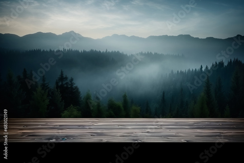 Empty black wooden table against a misty and dark forest in the mountains. Suitable for montage or displaying your products. 
