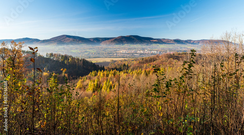 Trinec city with Moravskoslezske Beskydy mountains on the background in Czech republic during autumn morning