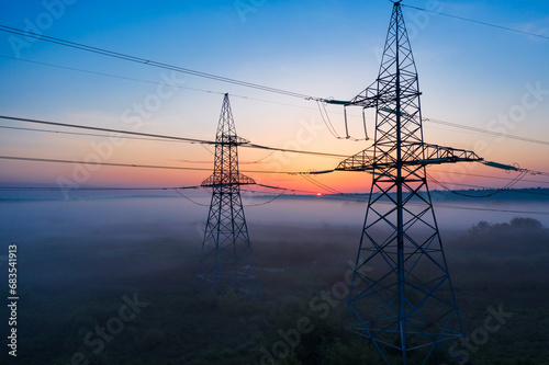 The Day Awakens: A Visual Symphony of Power Lines at Sunrise