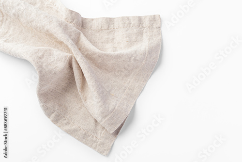 Natural linen kitchen cloth on white background, closeup
