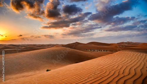 Sand dunes at sunset in the Wahiba Sands desert with clouds in the sky, Oman, Middle East