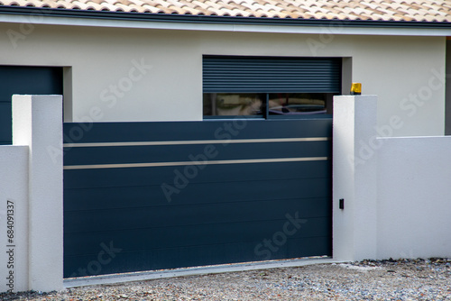 dark gray slide aluminum gate sliding portal of suburb house door entry