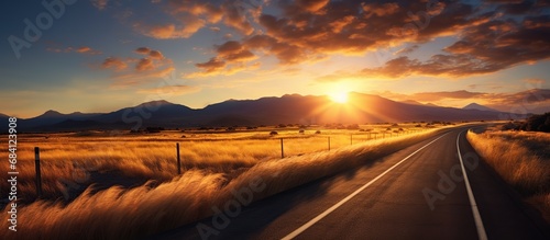 Long road surround by unique sunset sky landscape. AI generated image