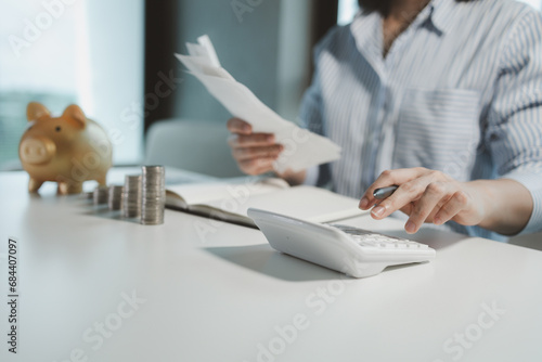 The operator is checking the purchase receipt, Finance employees are calculating various expenses to record in the system, Receive a receipt from the purchasing department and verify its accuracy.