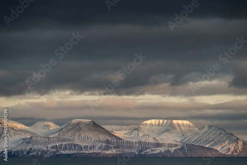 Evening atmosphere, snowy mountains, Nordfjorden, Isfjord, Spitsbergen, Svalbard, Norway, Europe