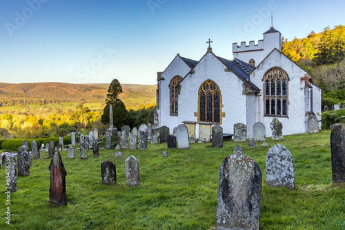 The pretty whitewashed church of All Saints in Selworthy, Exmoor National Park, Somerset.
