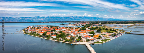 Historic town of Nin laguna aerial view with Velebit mountain background, Dalmatia region of Croatia. Aerial view of the famous Nin lagoon and medieval in Croatia